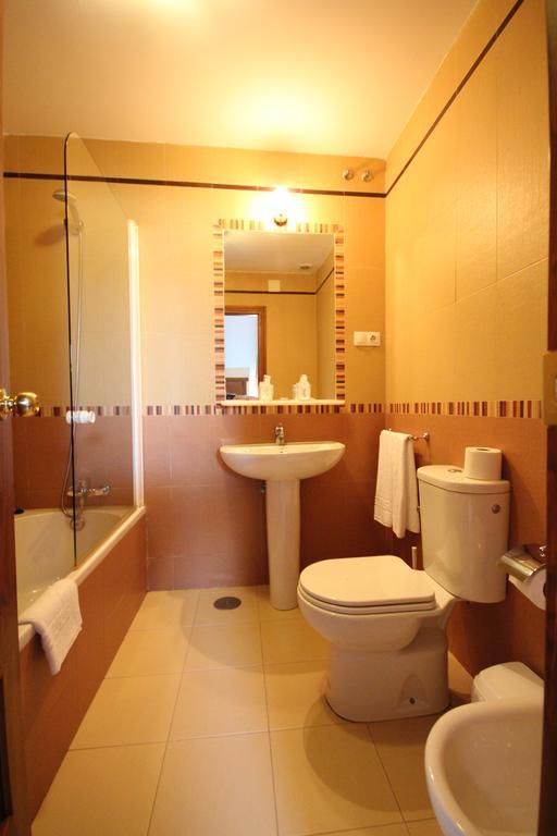 Hostal Niza San Juan Del Puerto Bilik gambar